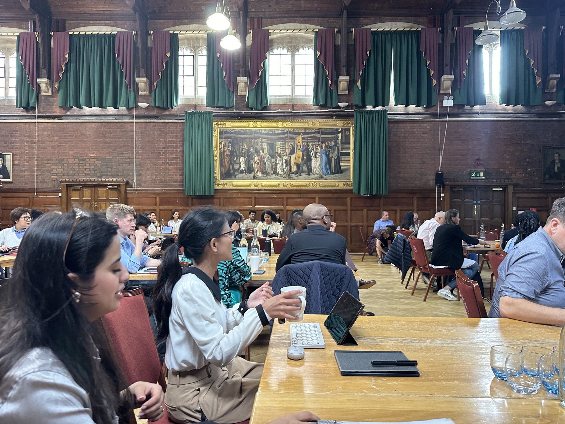 Practitioners convened in a traditional hall
